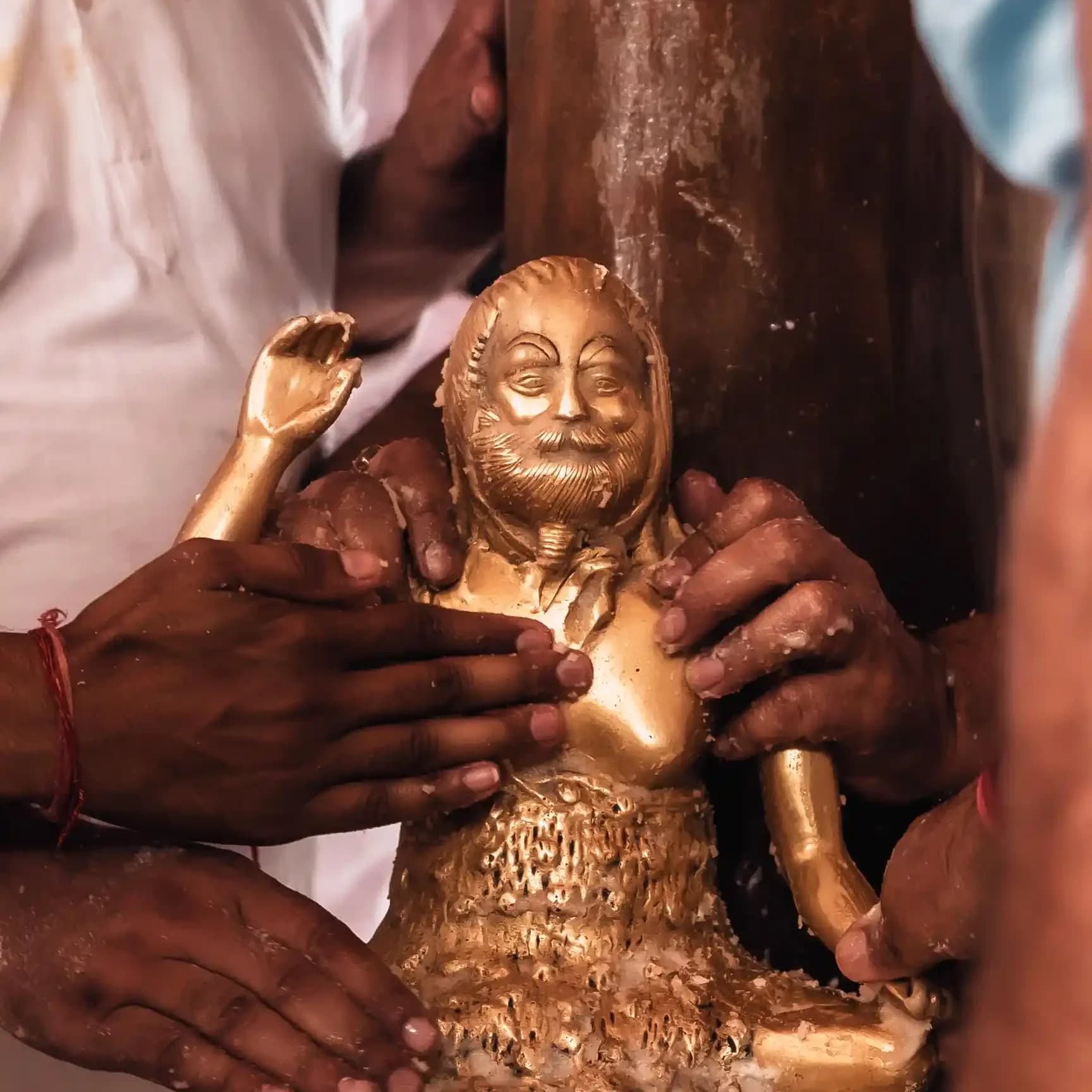 A golden kalash — Baba’s sacred Abhisheka